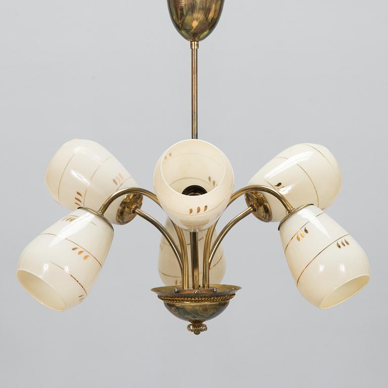 A mid-20th-century brass ceiling light, Finland.