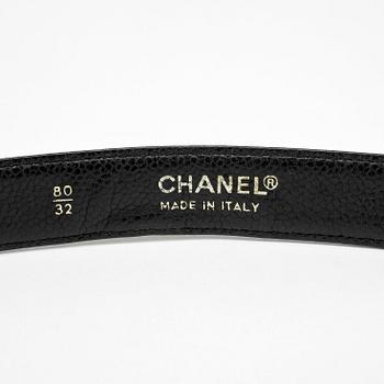 CHANEL, a black leather belt.
