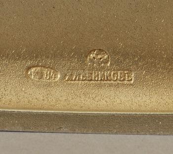 A Russian parcel-gilt cigarette-case, makers mark of Ivan Chlebnikov, Moscow 1908-1917. Imperial Warrant.