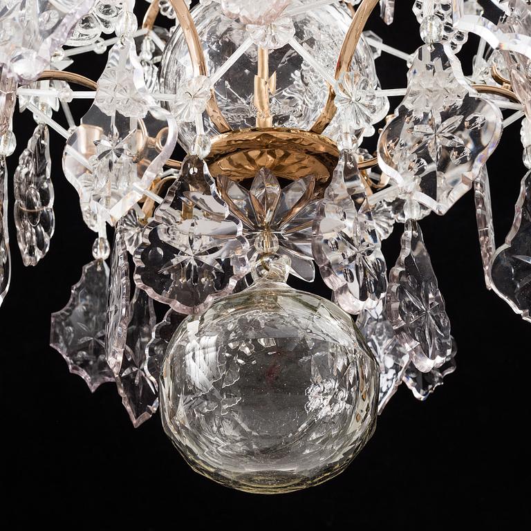 A 18th-20th century rococo and rococo style chandelier.