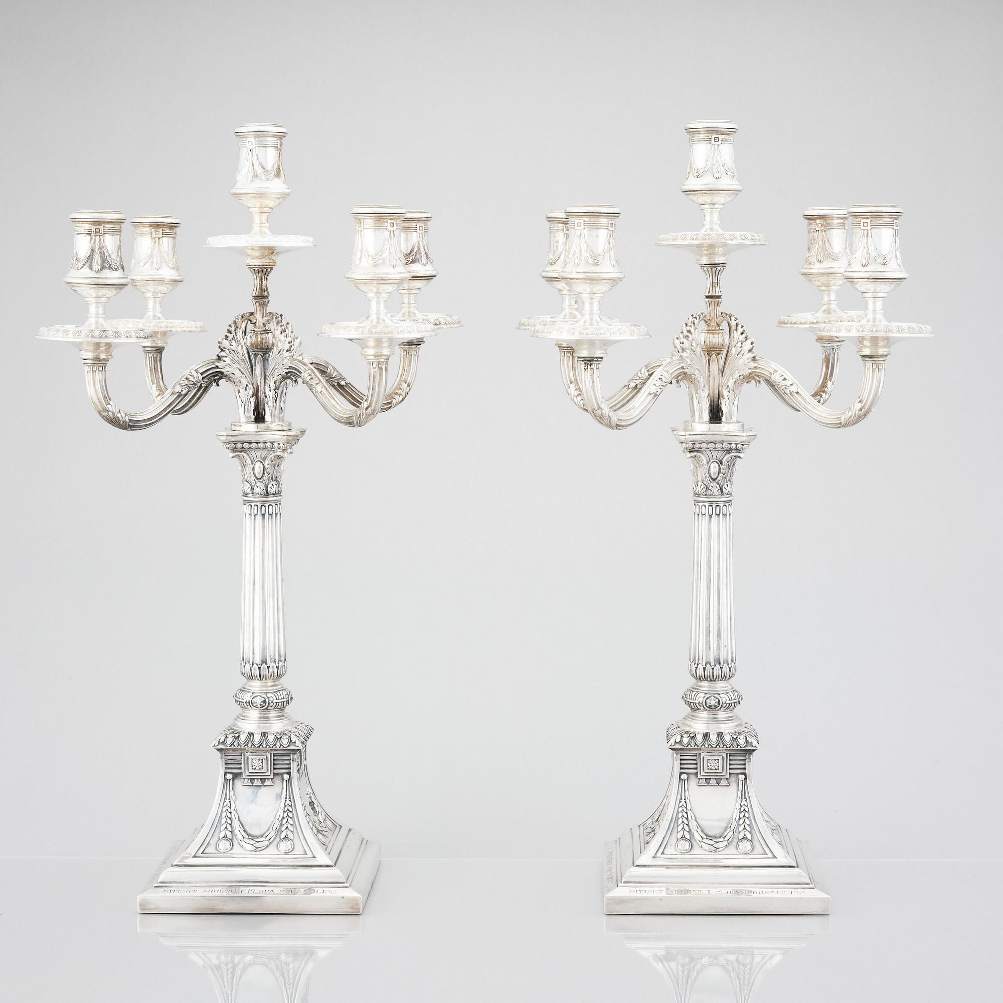 A pair of Swedish silver candelabras, mark of Svea Svensson, Stockholm 1908.