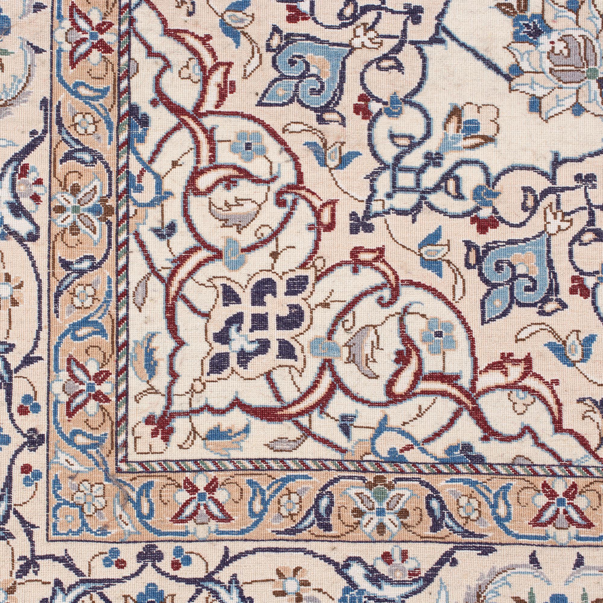 A Nain Habibian rug, part silk. Around 210 x 133 cm.