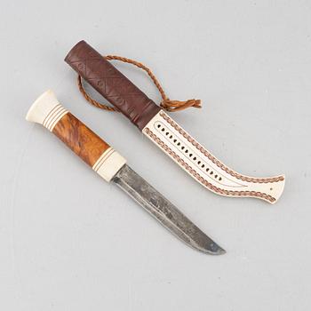 Per Anders Nutti, a reindeer antler knife, signed.