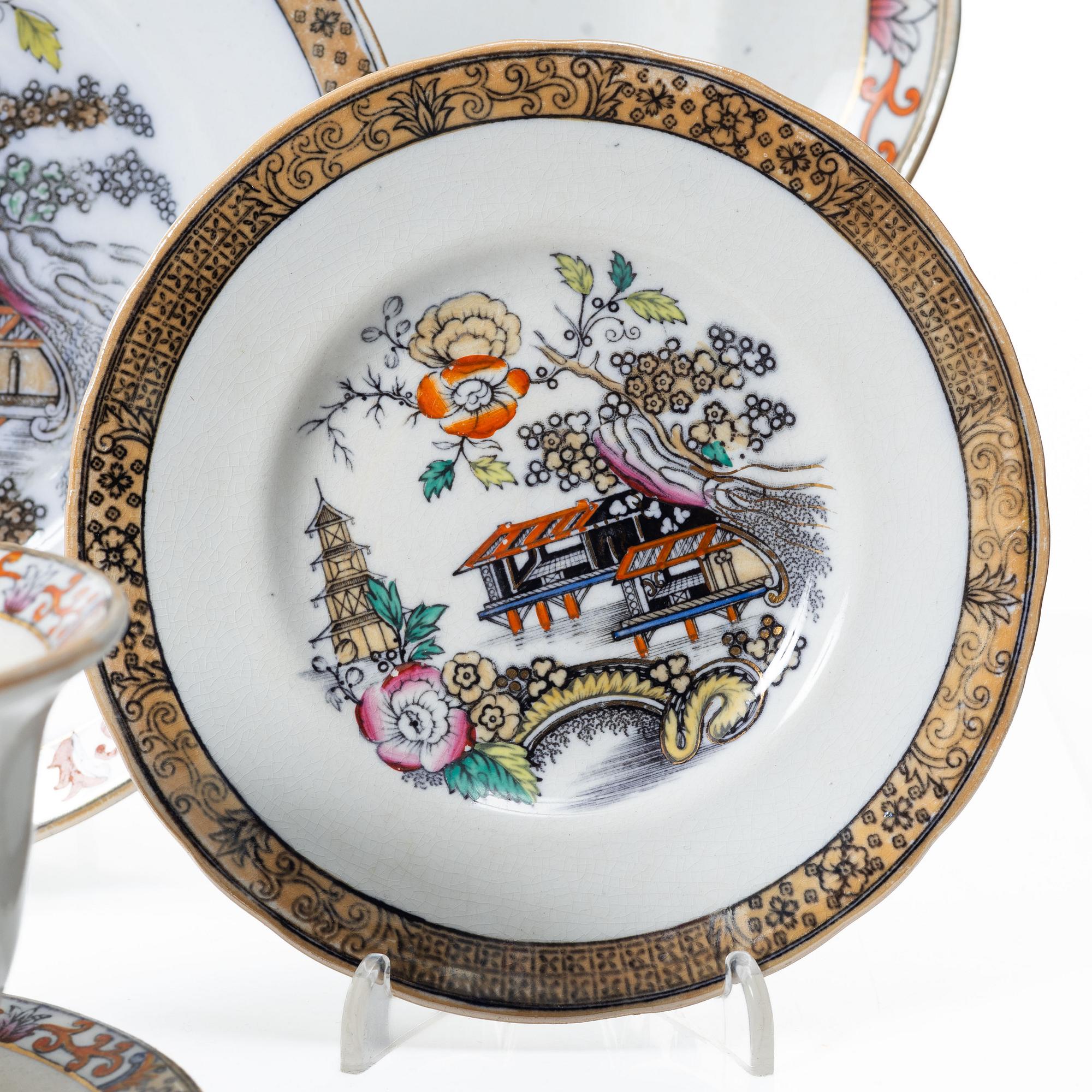 A Swedish "Japan" creamware dinner service, Rörstrand, 1866-1925. (c. 80 pieces).