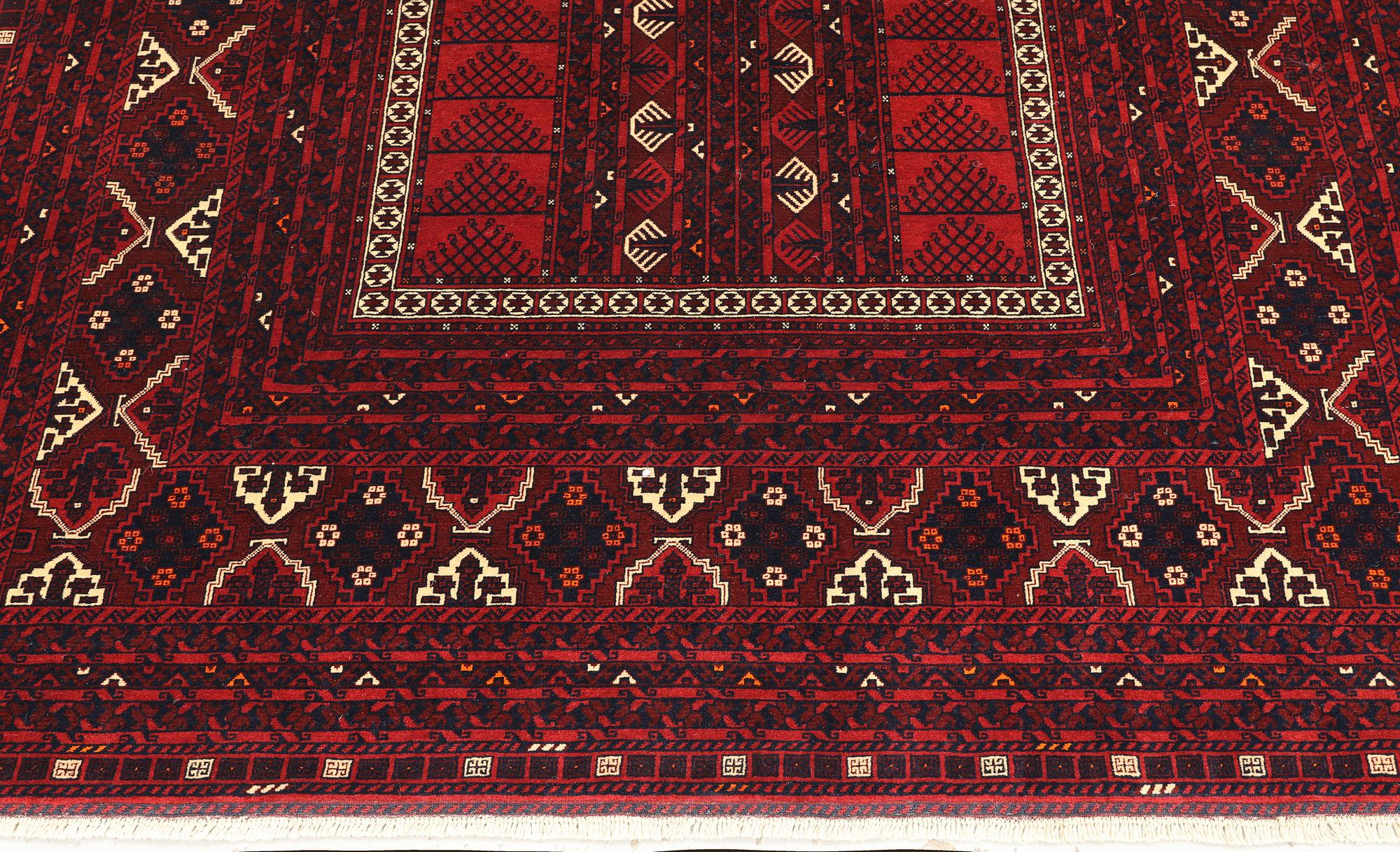A Afghan carpet, 256 x 168 cm.