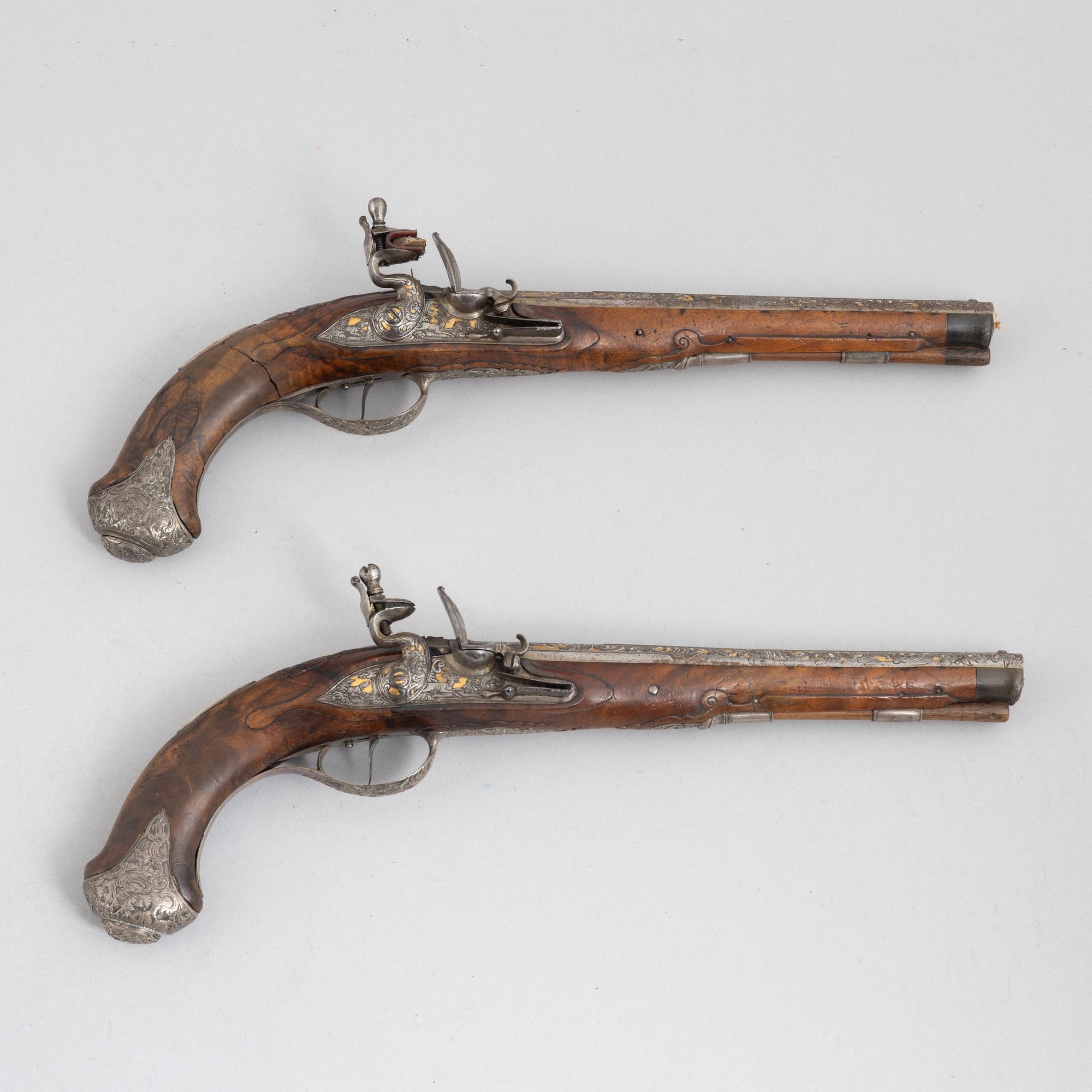 A Pair of flintlock pistols, by Johann Jacob Kuchenreuter, (Regensburg 1709-1783, Royal gunsmith).