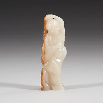 A carved nephrite figurine, presumably late Qing dynasty (1644-1912).