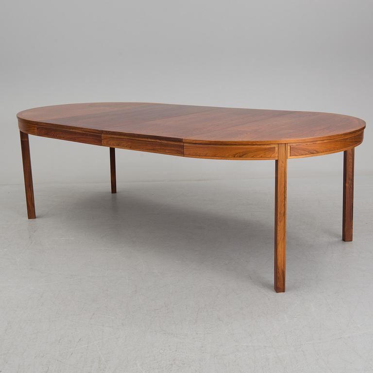 A rosewood dining table by Bertil Fridhagen for Bodafors.