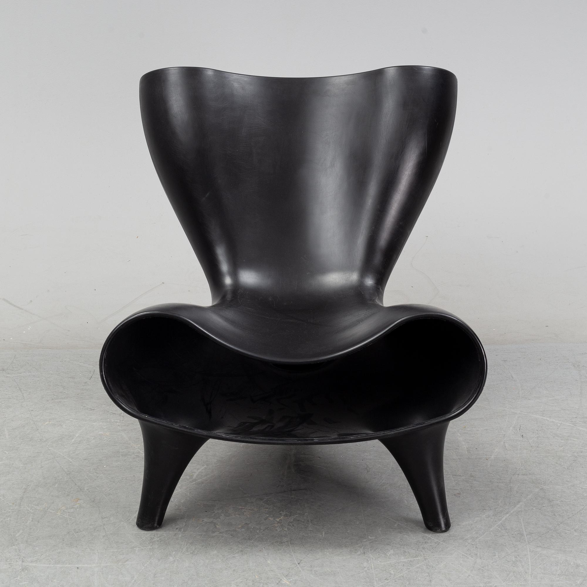 A Marc Newson, a 'Orgone' chair, designed 1993.