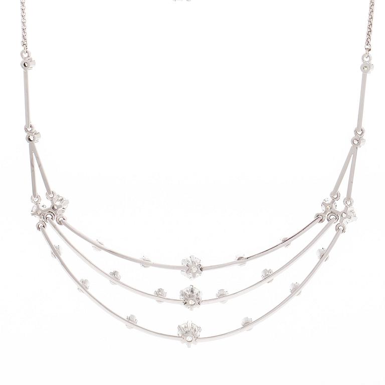 Collier, 18K vitguld med briljantslipade diamanter. A Tillander 1973.
