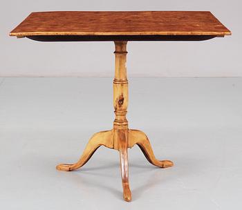 Two matched Swedish first halft 19th Century tilt-top tables by L. E. Lindell.