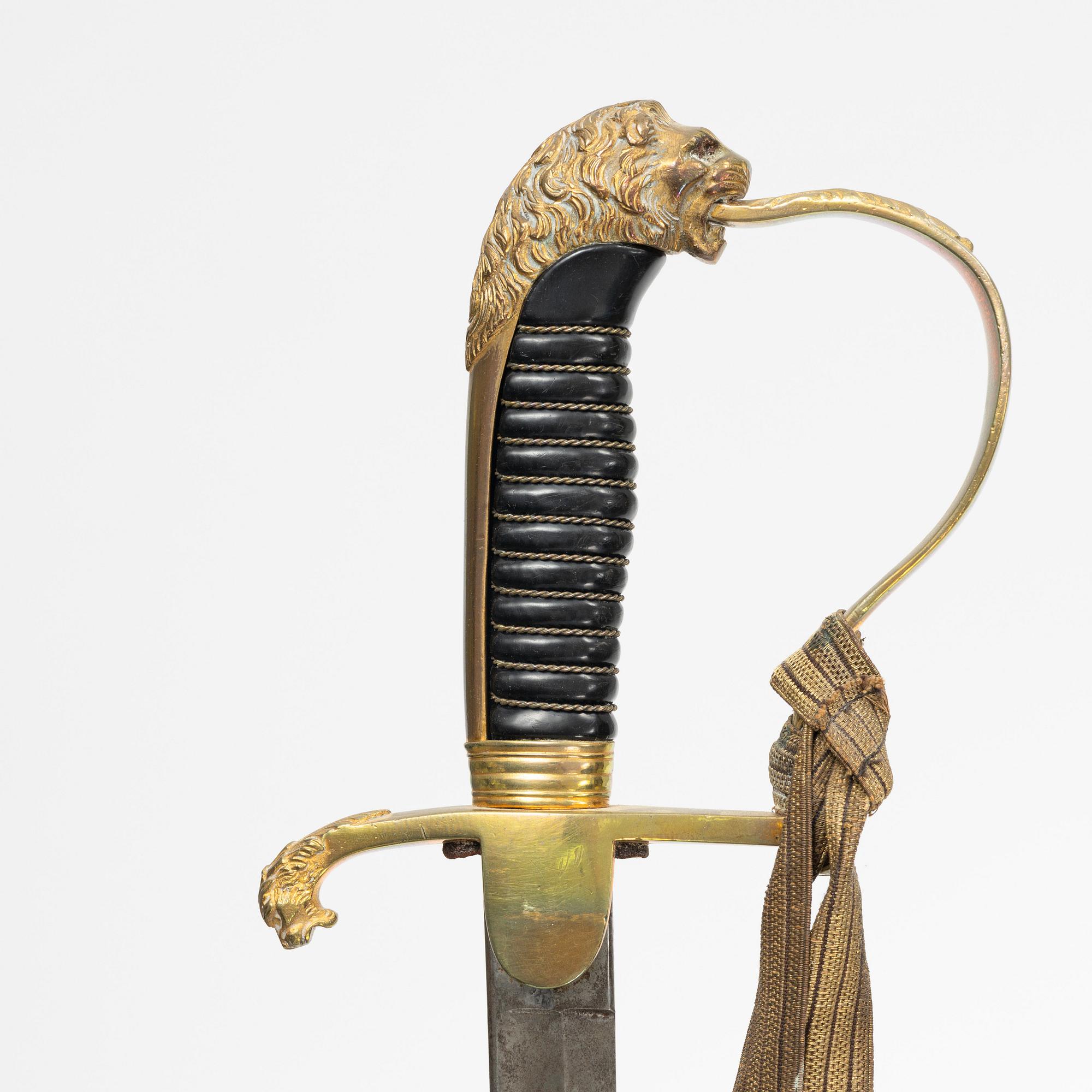 Two German sabres, 19th Century, one with scabbard.