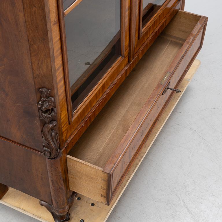 A mahogany veneered vitrine cabinet, mid 19t Century.