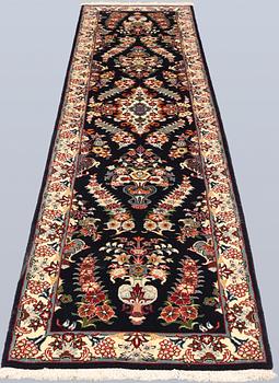 A Sarouk runner, approx. 310 x 72 cm.