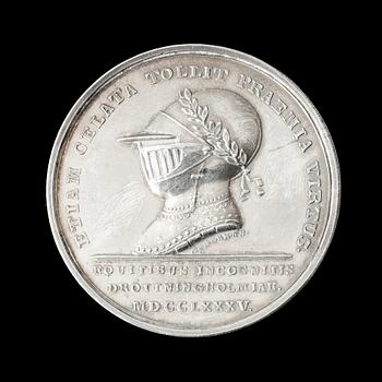 MEDALJ. Gustav III:s karusell/tornering på Drottningholm 1785. Utförd av G. Liungberger/C.G. Fehrman. Silver 4,2 cm 29 g.