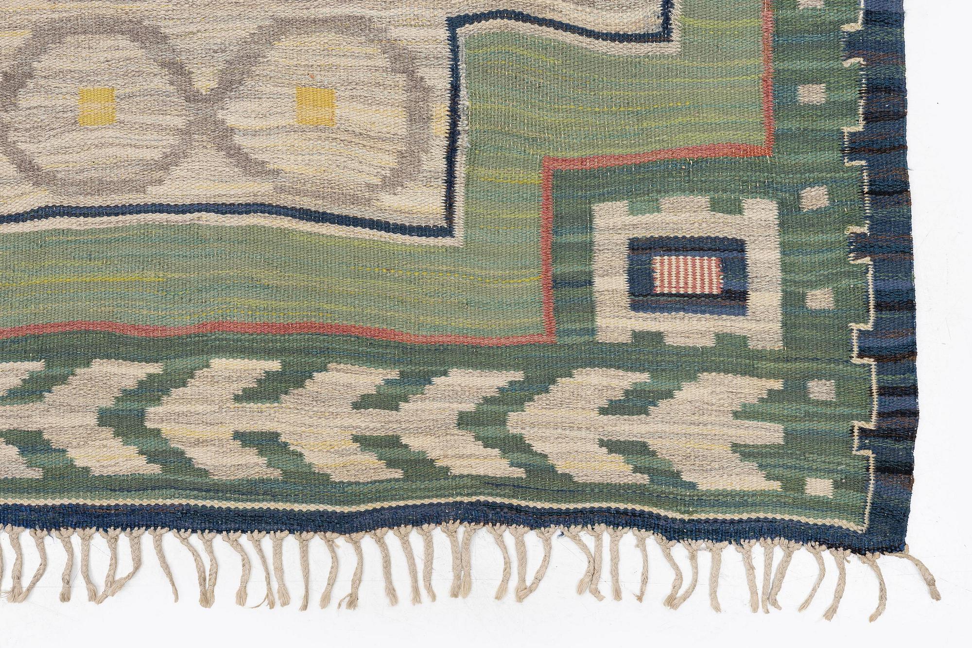 A carpet, flat weave, c. 340 x 246 cm, signed JBV (Johanna Brunssons Vävskola).