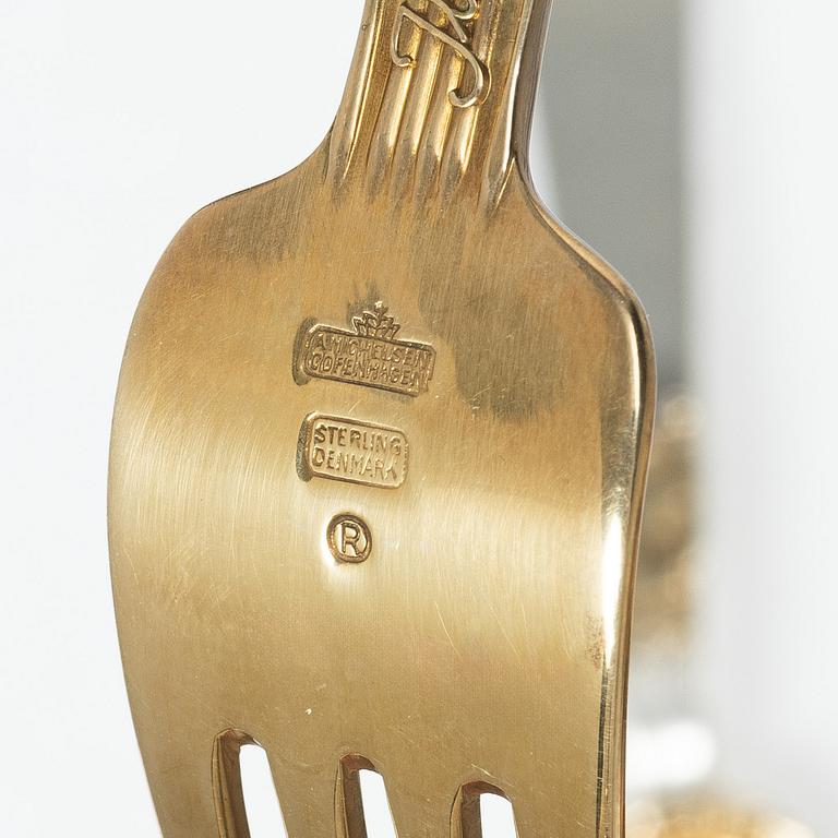 Anton Michelsen, Annual/Christmas cutlery, 8 pieces, gilt sterling silver and enamel, Denmark, 1930s–40s.
