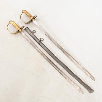 Two Swedish cavalry swords 1867-93 pattern, one with scabbard.