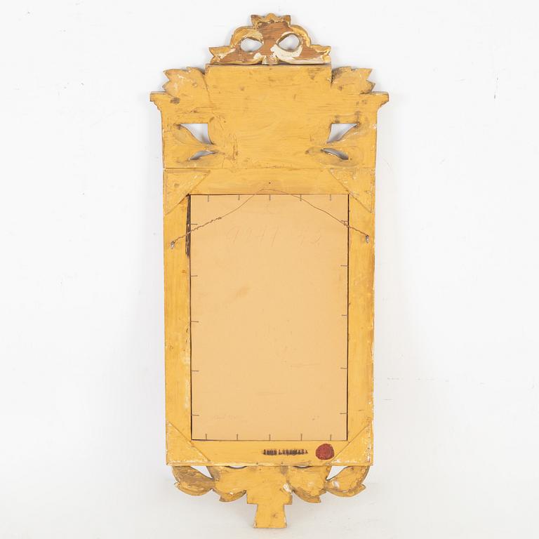 A Gustavian style mirror by John Lundmark, 20th Century.