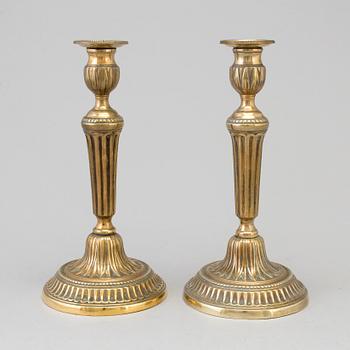 A pair of late 18th century Gustavian bronze candlesticks.