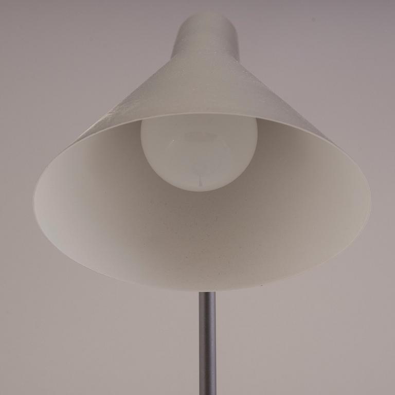 An Arne Jacobsen "AJ" table lamp.