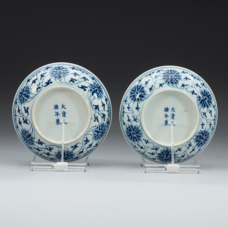 A pair of blue and white lotus dishes, Qing dynasty, Guangxu mark and of period (1874-1908).