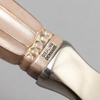 A Danish 20th century set of three Georg Jensen silver openers.