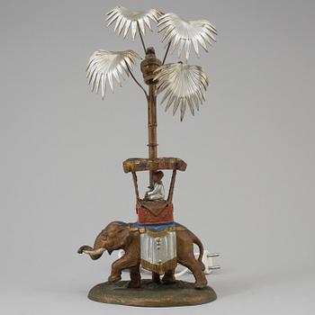 An early 20th century colonial style table lamp.