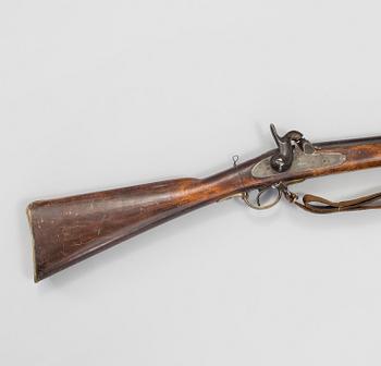 A Swedish 19h Century percussion rifle made by Carl Gustaf stads gevärsfaktori, dated 1851. With bayonet.