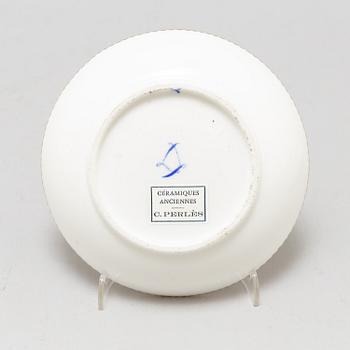 A pair of cups and saucers, "Sévrès"like mark, 19th century.