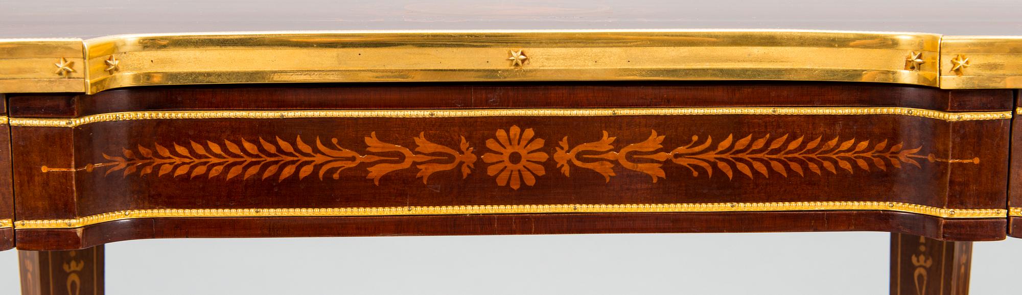A Directoire style marquetry table from around year 1900.