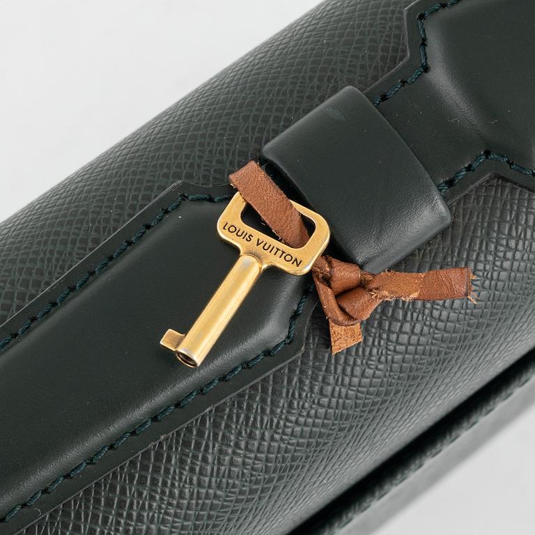 Louis Vuitton, a green Taiga 'Kourad' briefcase, 1997.