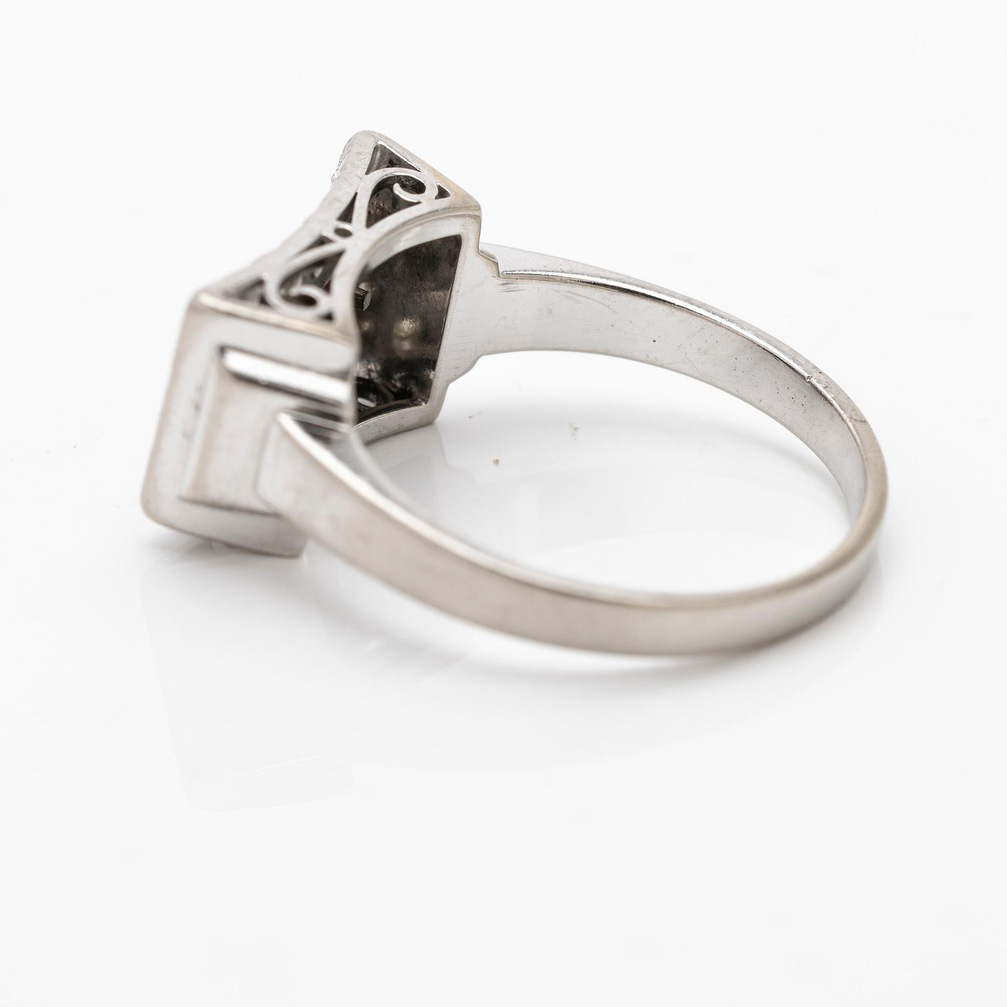 Ring 18K vitguld med diamanter och rubiner, Joh. Petterssons Stockholm 1957.