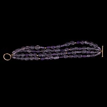 COLLIER, ARMBAND, RING samt BROSCH, ametister, 10/14K guld. 2000-tal.