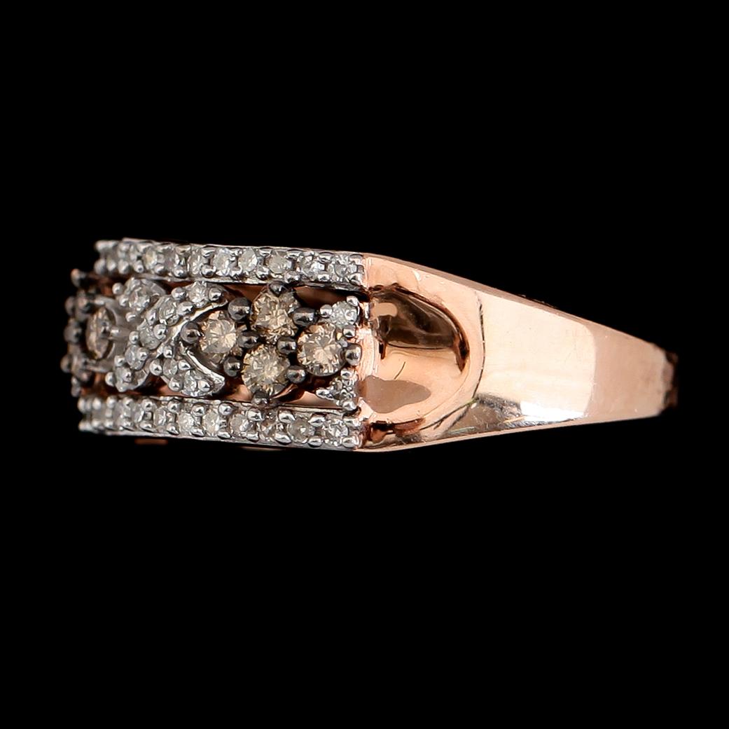 RING, 14K roséguld, diamanter tot ca 0.75 ct. Vikt ca 5 g.