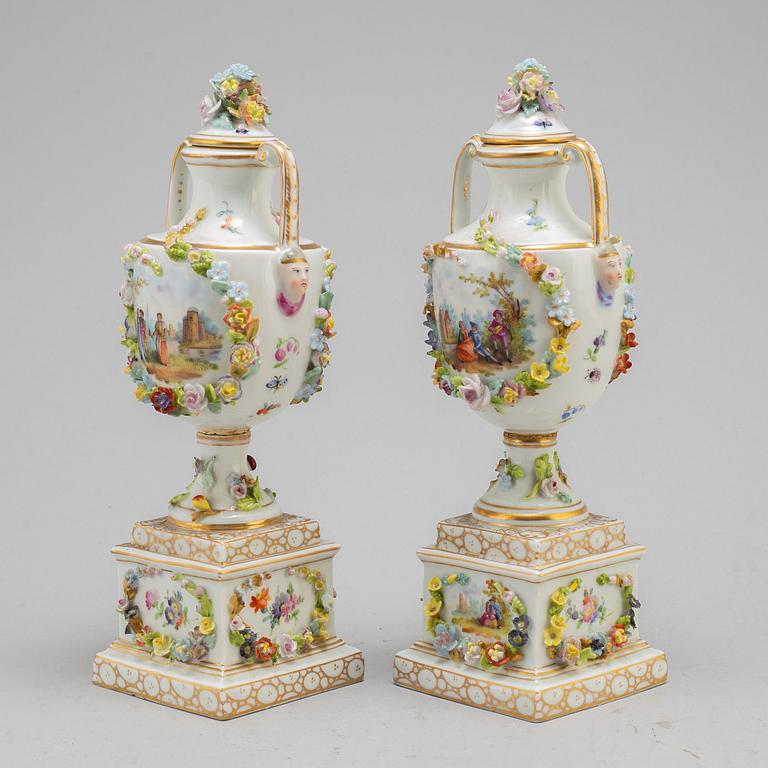 A pair of 19th century lidded vases, porcelain, Germany.