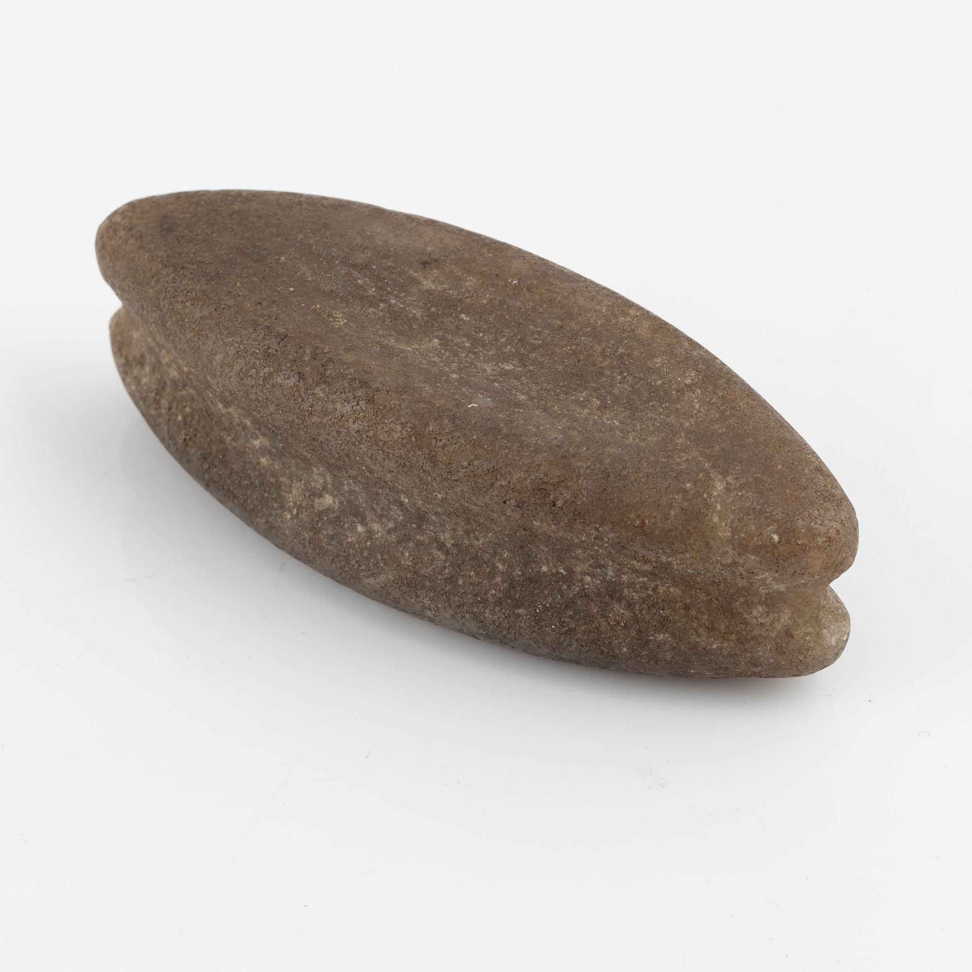 A neolithic strike-a-light stone. - Bukowskis