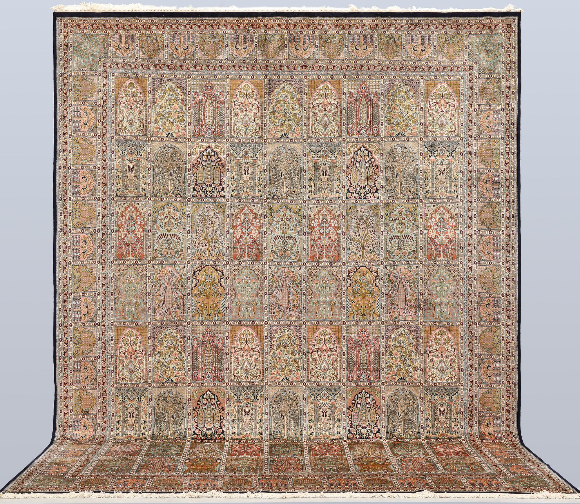 A silk carpet, Kashmir, c. 402 x 300 cm.