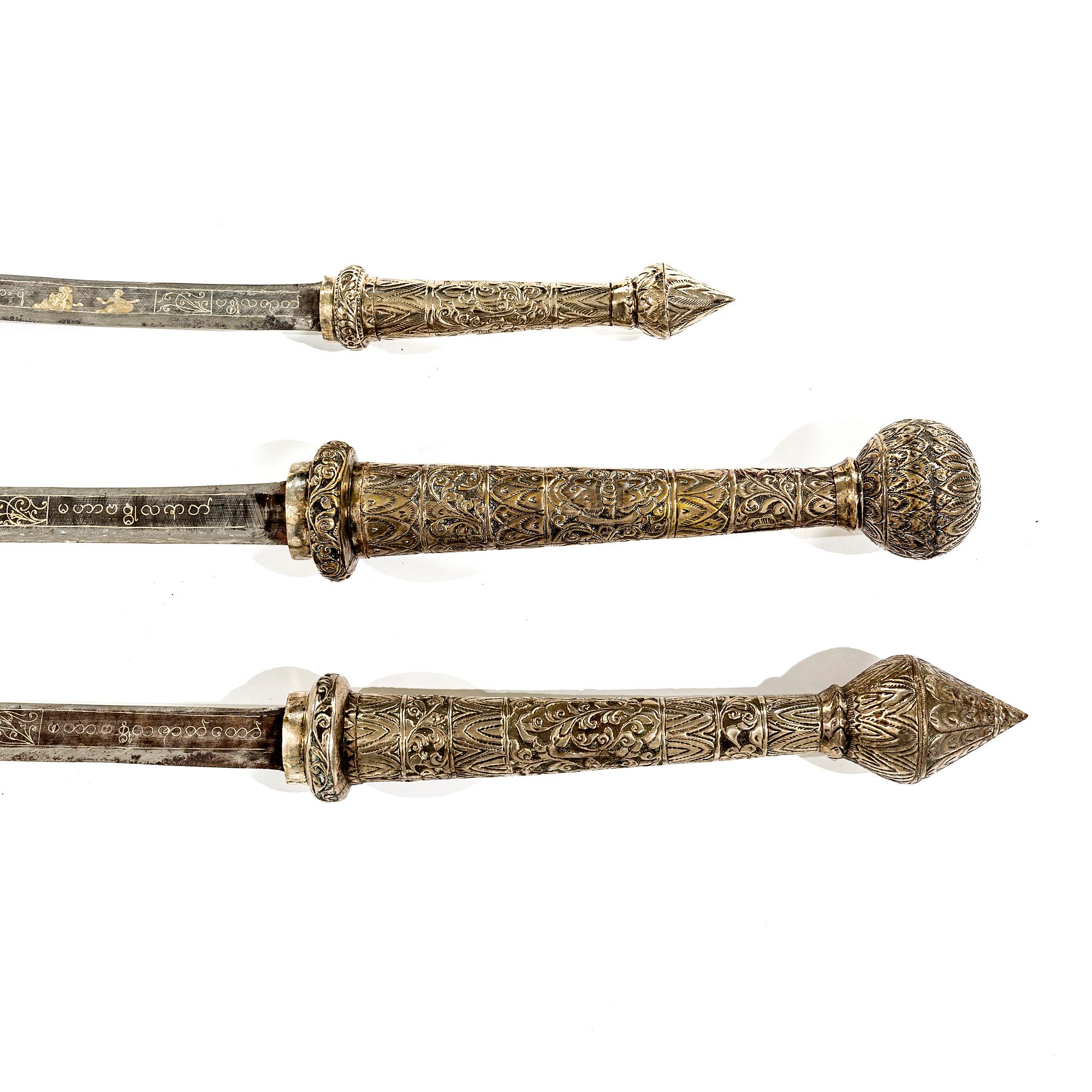 A set of three Burmese 'Dha' swords, late 19th /early 20th Century.