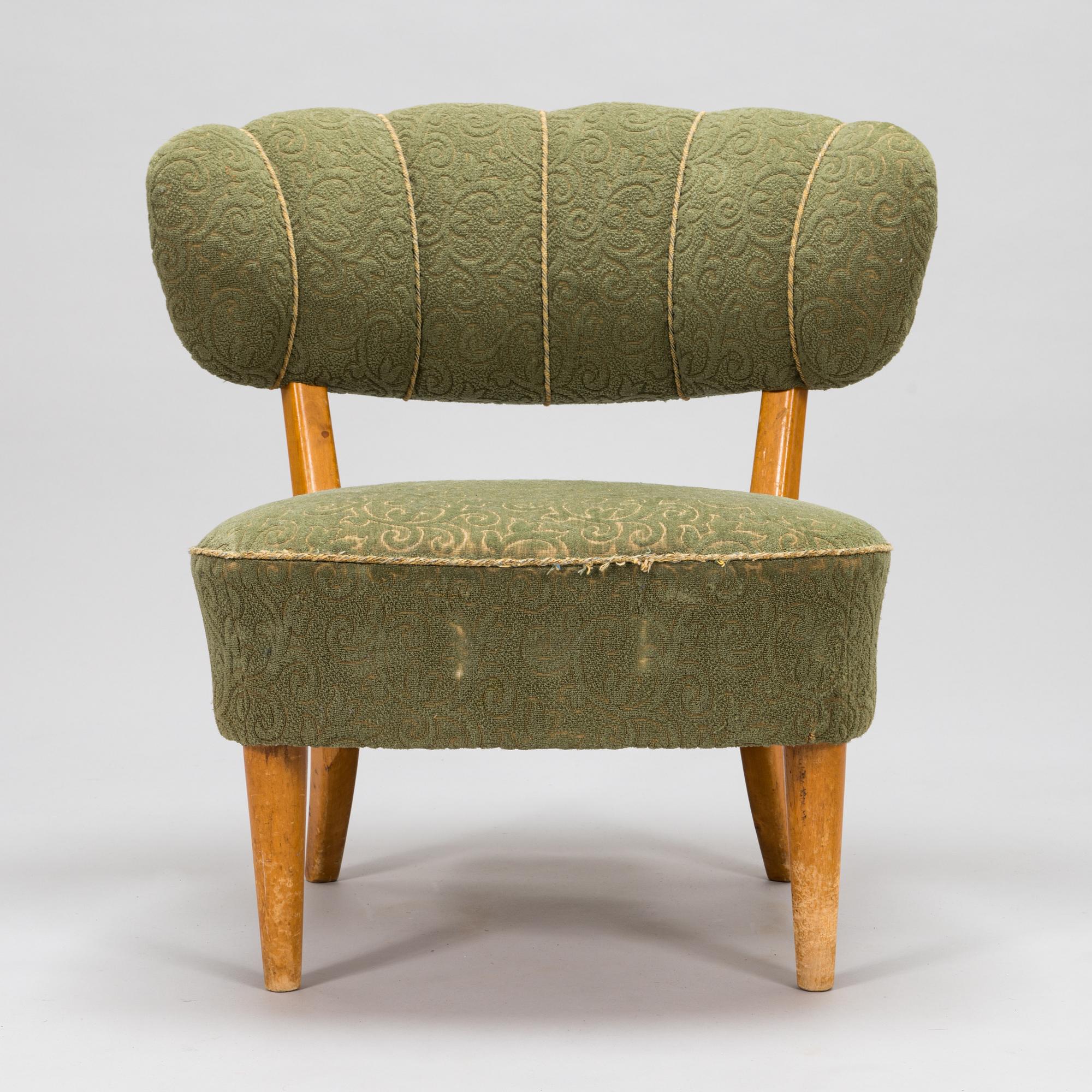 Lisa Johansson-Pape, a 1940's armchair for  Keravan Puusepäntehdas, Stockmann.