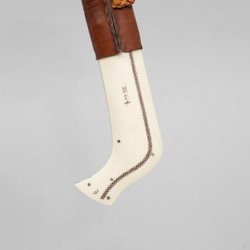 Ingvar Backlund, a reindeer horn knife, signed and dated 99-XX.