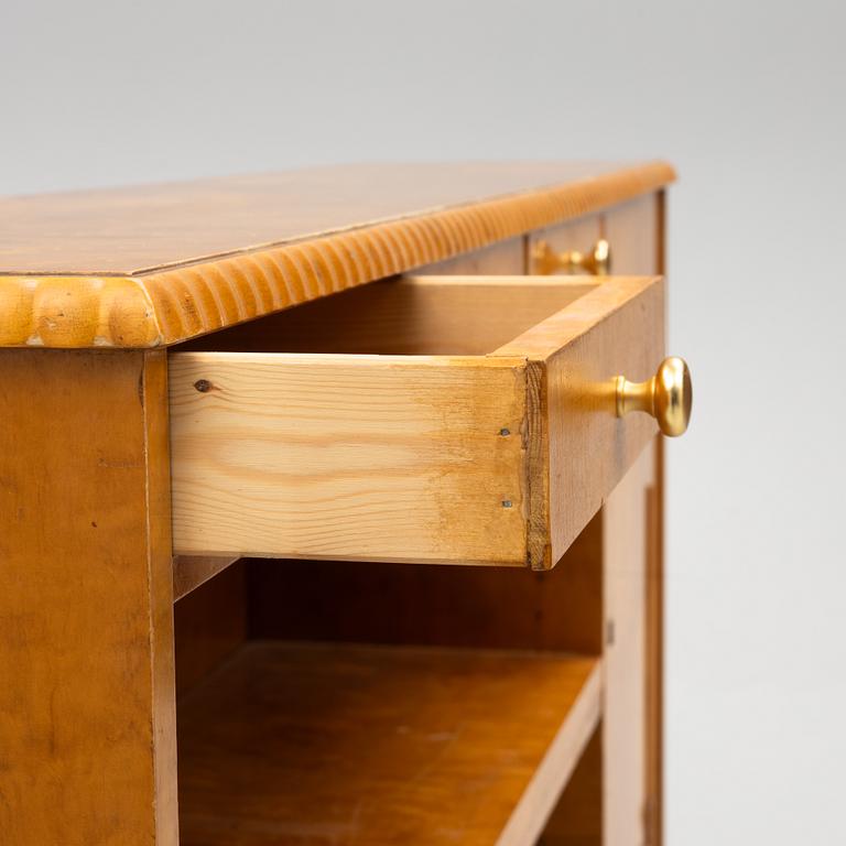 A bookcase with cabinet, 1940's.