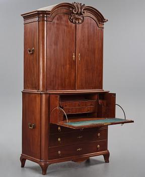 A Swedish rococo mahogany writing cabinet attributed to N. Dahlin (master in Stockholm-1761-87).