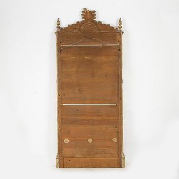 A Empire style mirror, second half of the 19th Century.