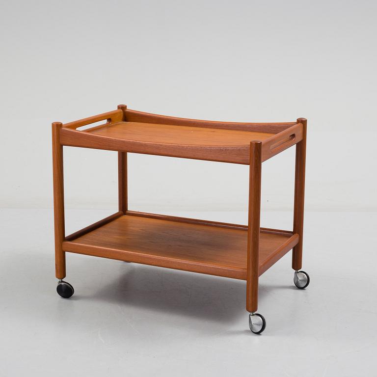 A Hans J Wegner serving trolley veneered with teak.