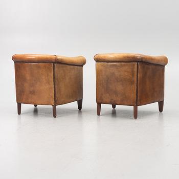 Club chairs, a pair, Bendic International, late 20th century.