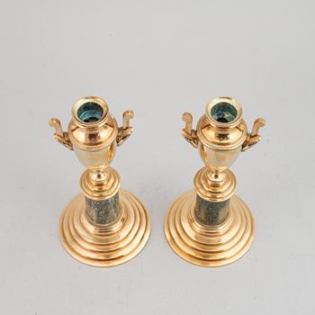 A pair of brass and marble candle holders/casslettes from Skultuna, 20th century.