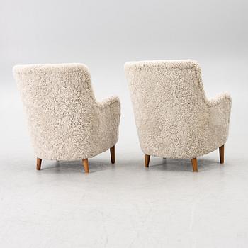 Carl Malmsten, A pair of Samsas easy chairs, second half of the 20th century.