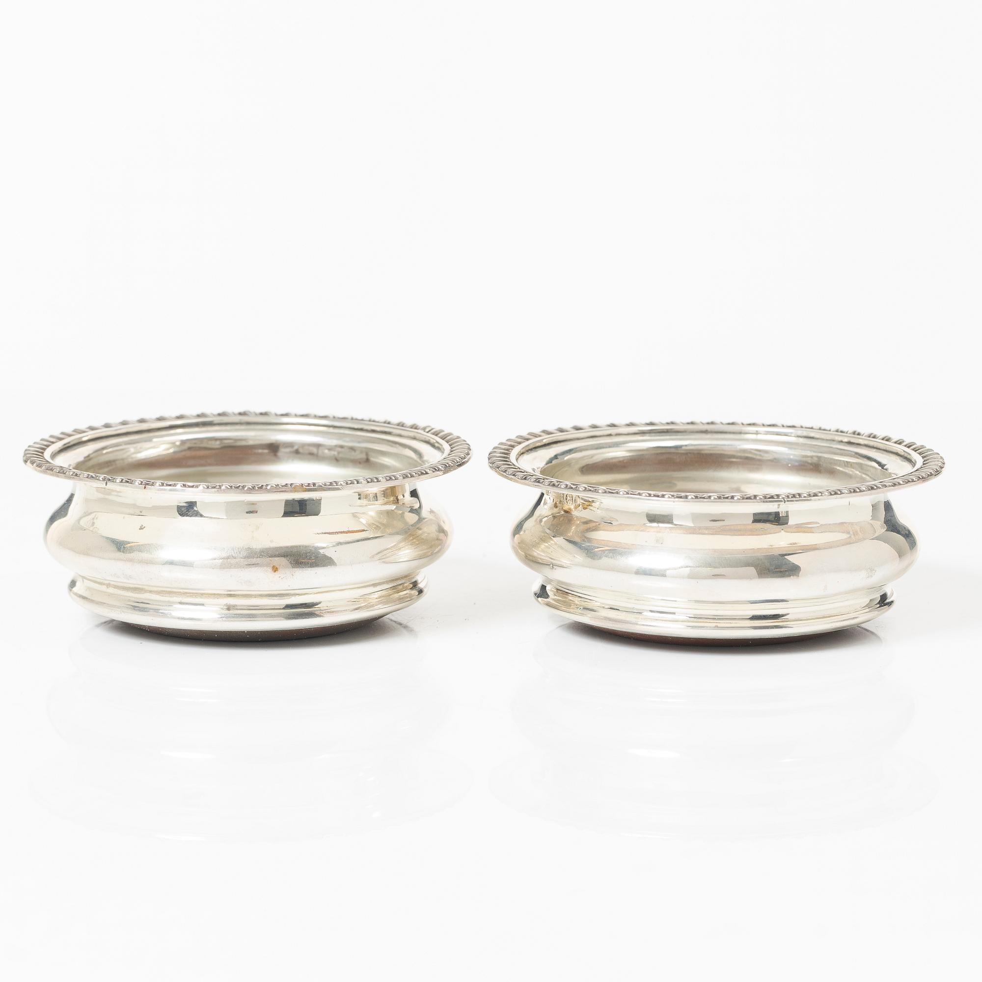 Coasters, a pair, silver, Birmingham, England, and shakers, a pair, silver, Norway.