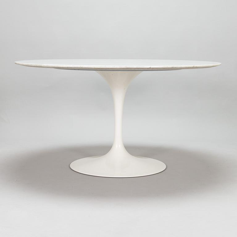 Eero Saarinen, a 1970s 'Tulip' marble-top table with six chairs.